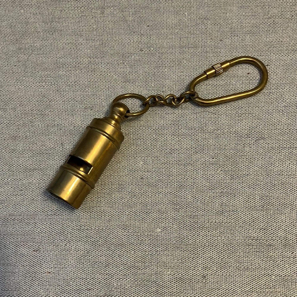 Gold whistle and key chain